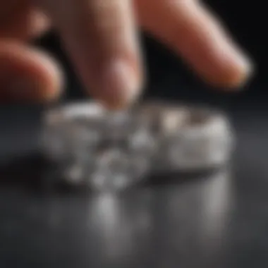 Diamond ring being gently scrubbed with soft brush