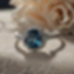 London blue topaz engagement ring on a vintage lace background