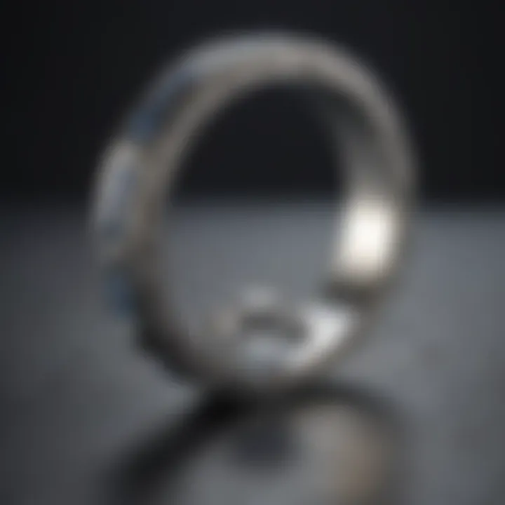Close-up of platinum ring being resized with precision tools